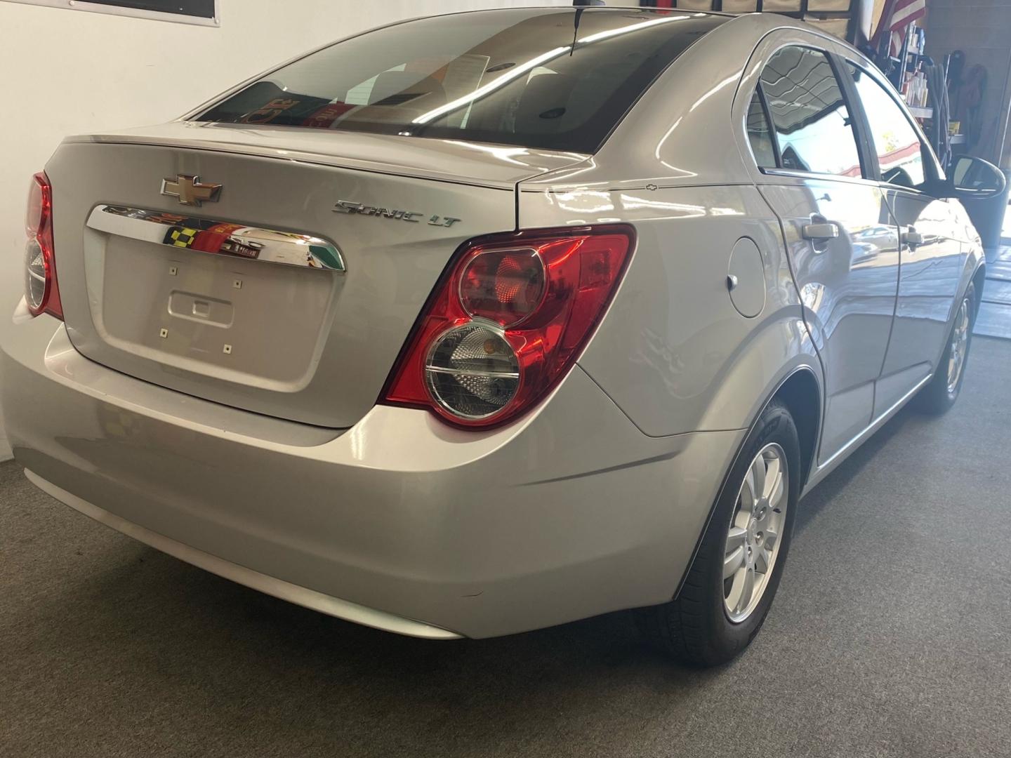 2012 SILVER /black Chevrolet Sonic (1G1JC5SH5C4) , located at 533 S West End Blvd., Quakertown, PA, 18951, (877) 257-4995, 40.343994, -75.303604 - INCLUDED IN THE SALE PRICE OF EVERY VEHICLE: 48 Hour Money Back Guarantee 6 Month - 6,000 Mile Warranty Brand New PA State Inspection & Emission $10 Oil Changes for the Life of the Loan Complete CARFAX - Photo#3